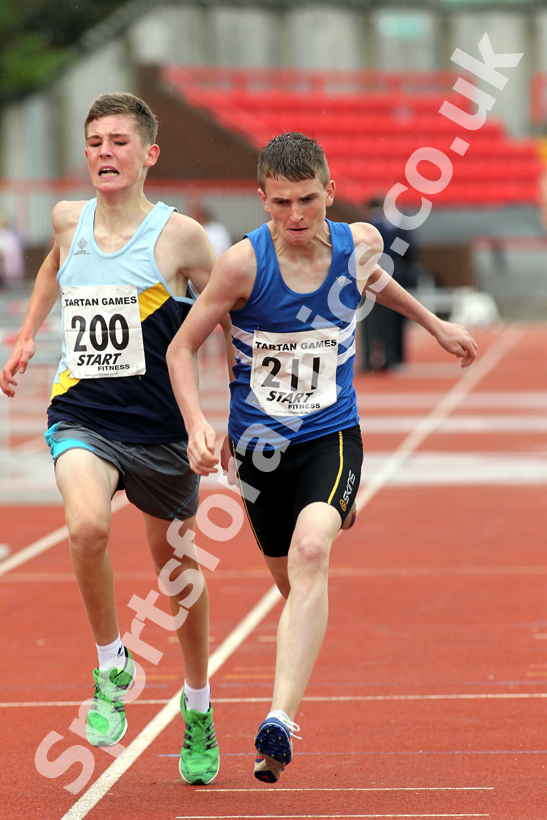 200 Henry Johnson (Chester-le-Street) and 211 Phillip Winkler (Morpeth Harriers), Under-15s 1500 metres, Gateshead Tartan Games